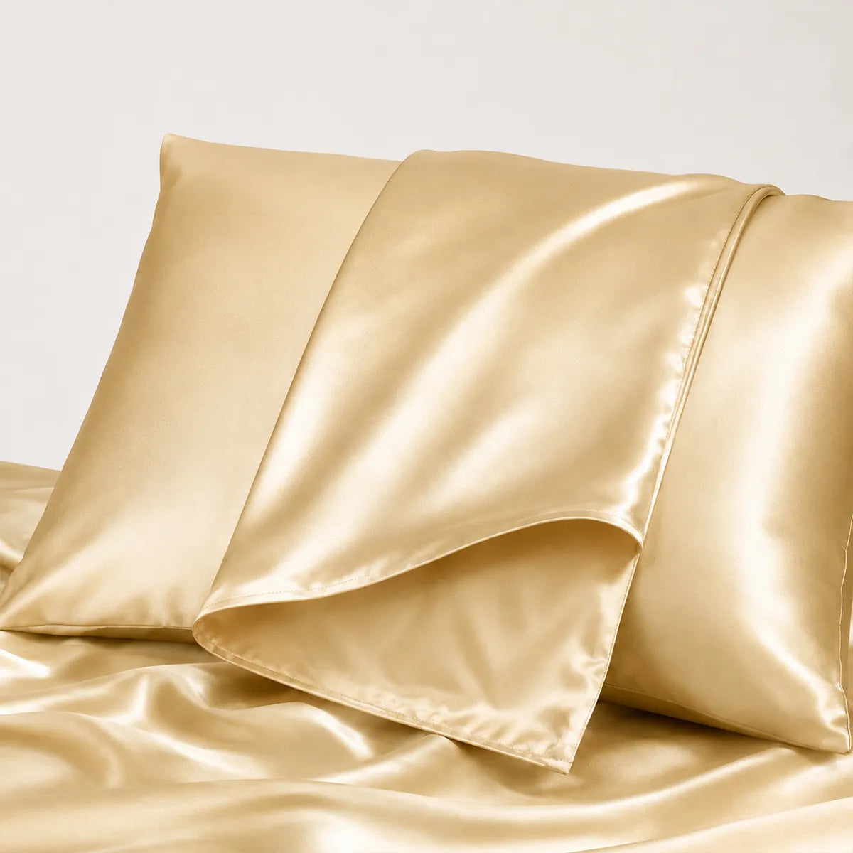 Champagne silk pillowcases with softly draped silk fabric