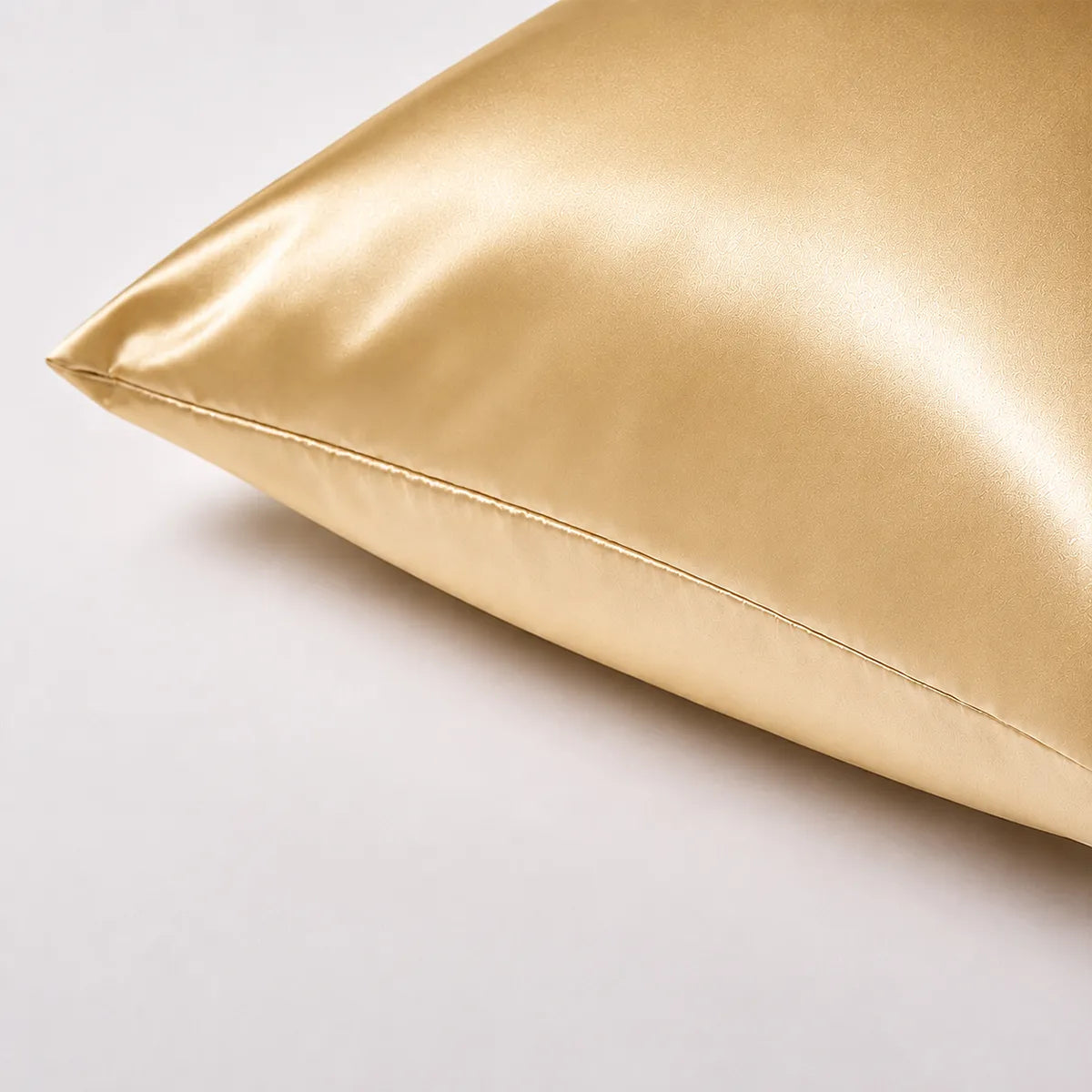 Champagne silk pillowcase with smooth stitching close-up